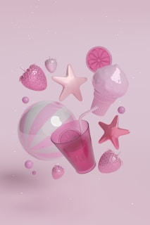 A pink background with stars and a glass of liquid
