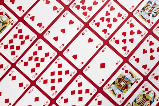 A close up of a red and white table cloth
