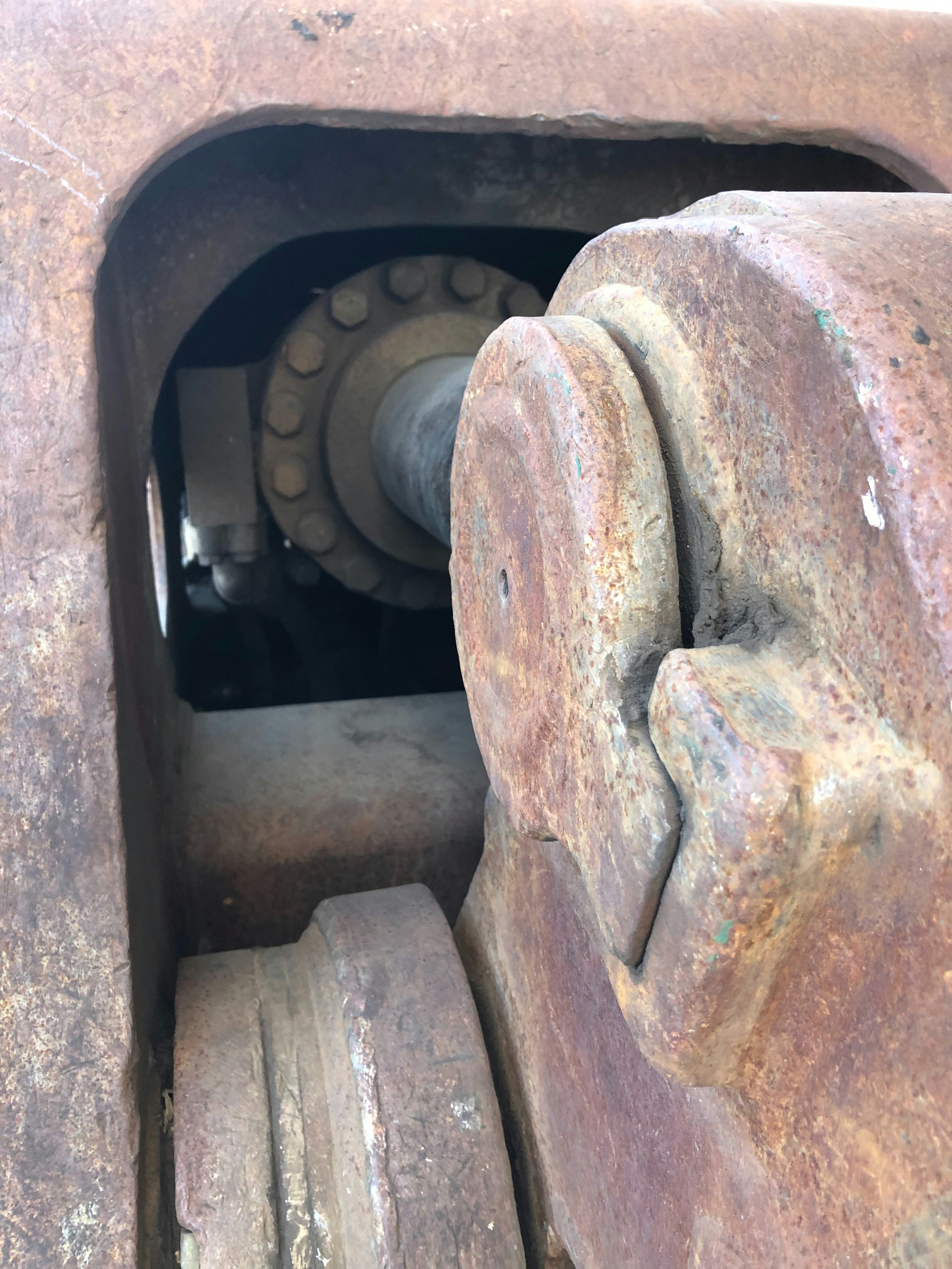 Industrial hydraulic machinery close-up, heavy metal pistons and cylinders, dark workshop atmosphere, dramatic industrial lighting