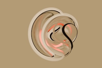 A picture of a circular object with a pink light