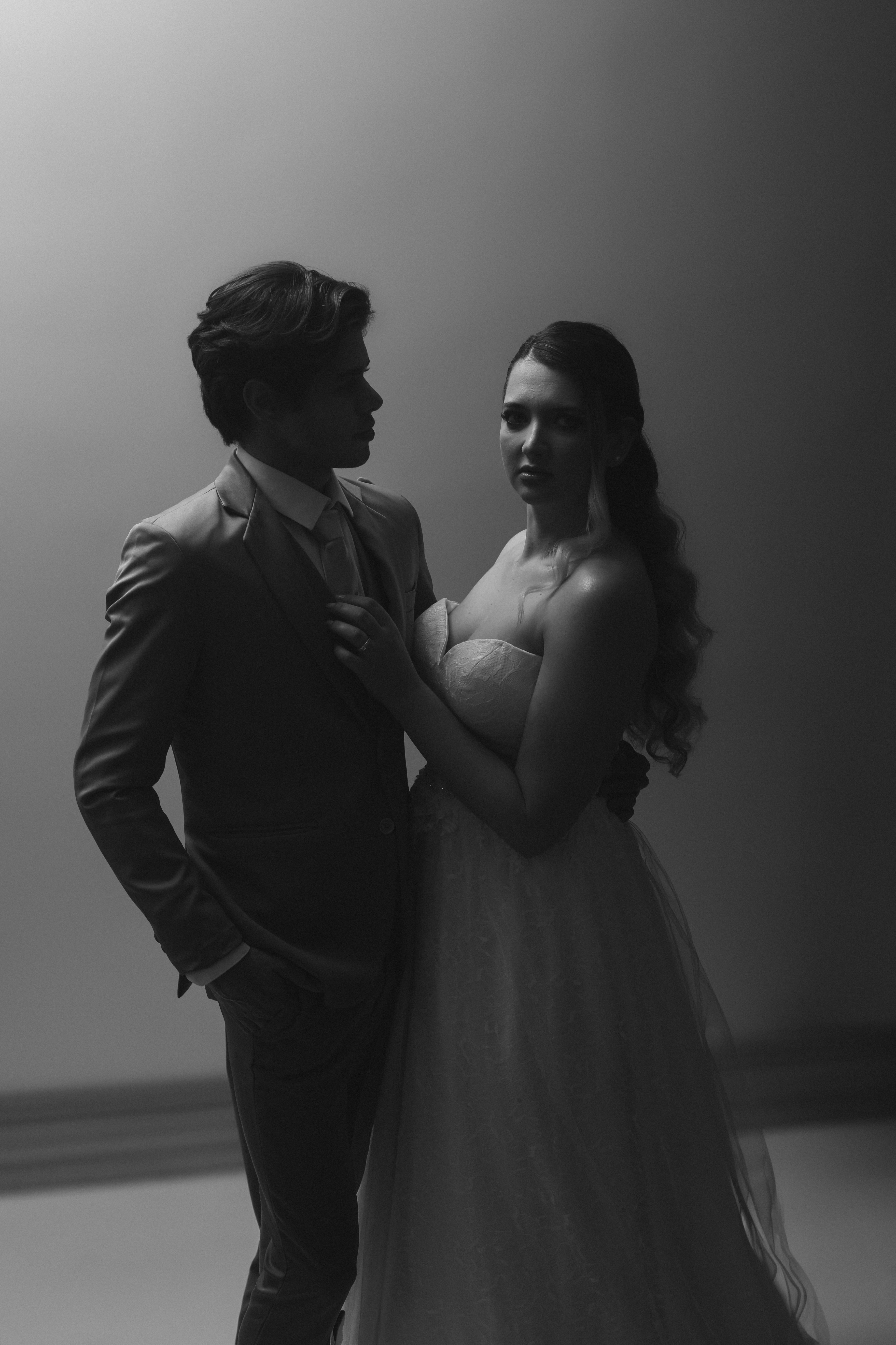 A man and a woman standing next to each other