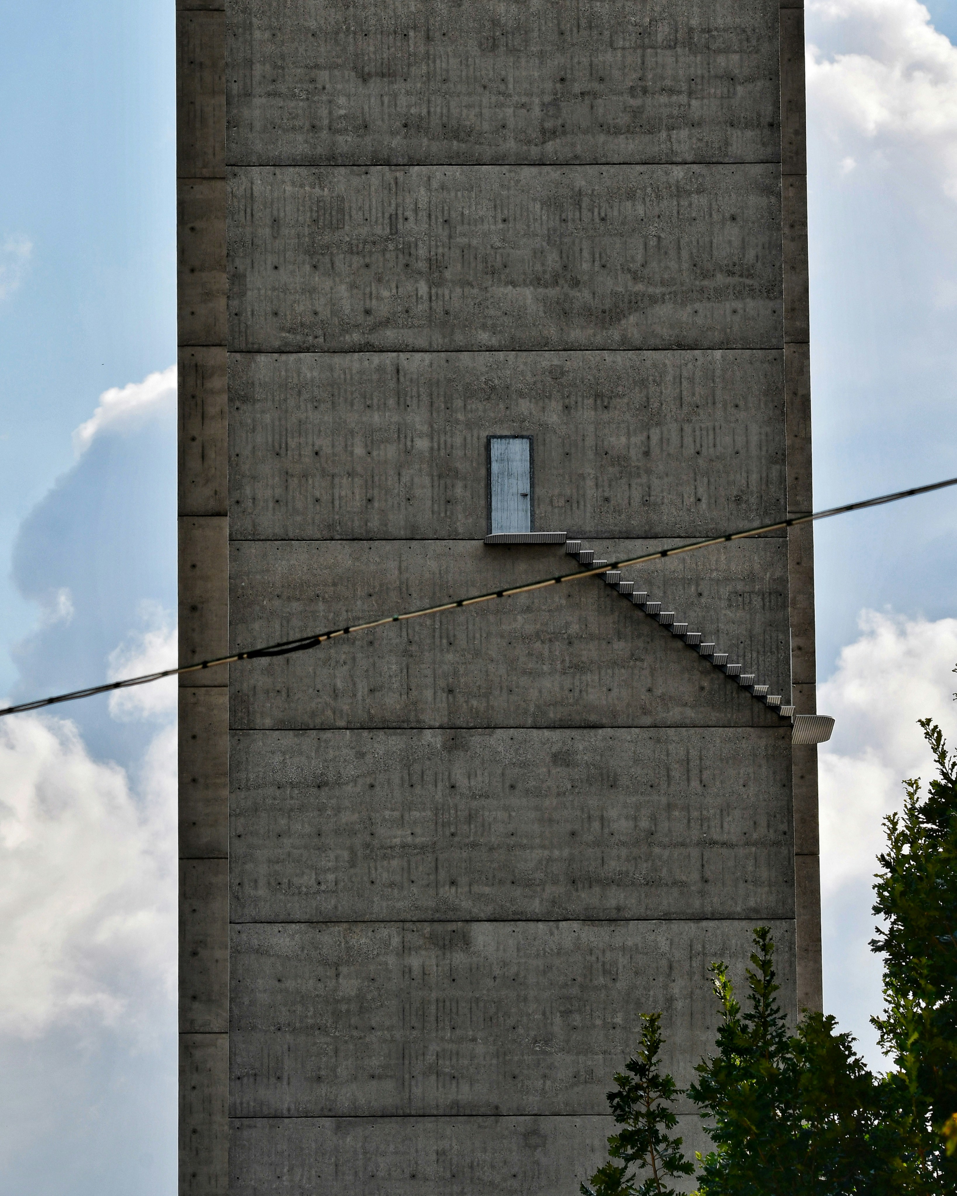 A tall building with a clock on the side of it