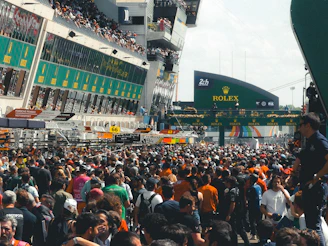 A large crowd of people are gathered in a stadium