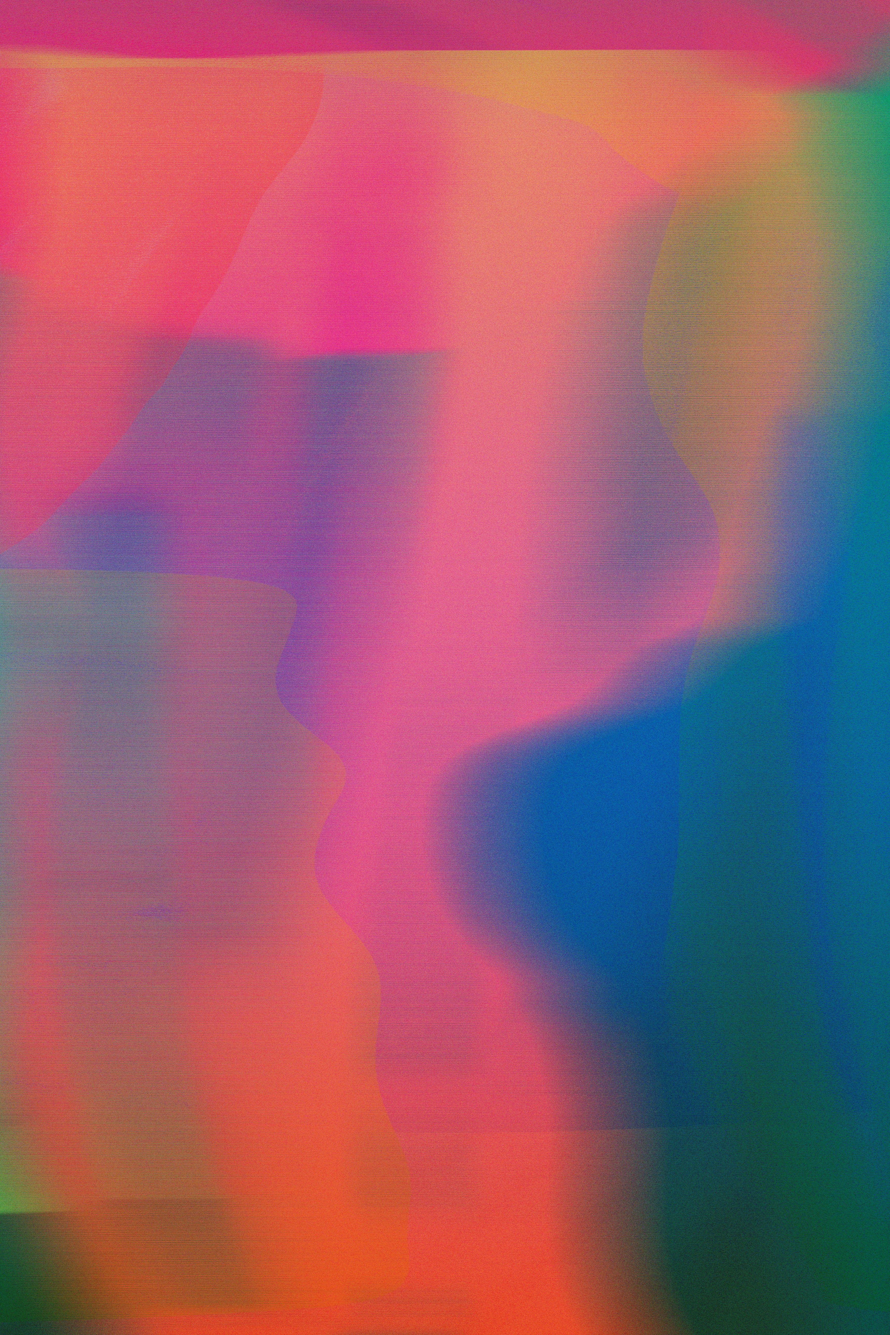 A blurry image of a multicolored background