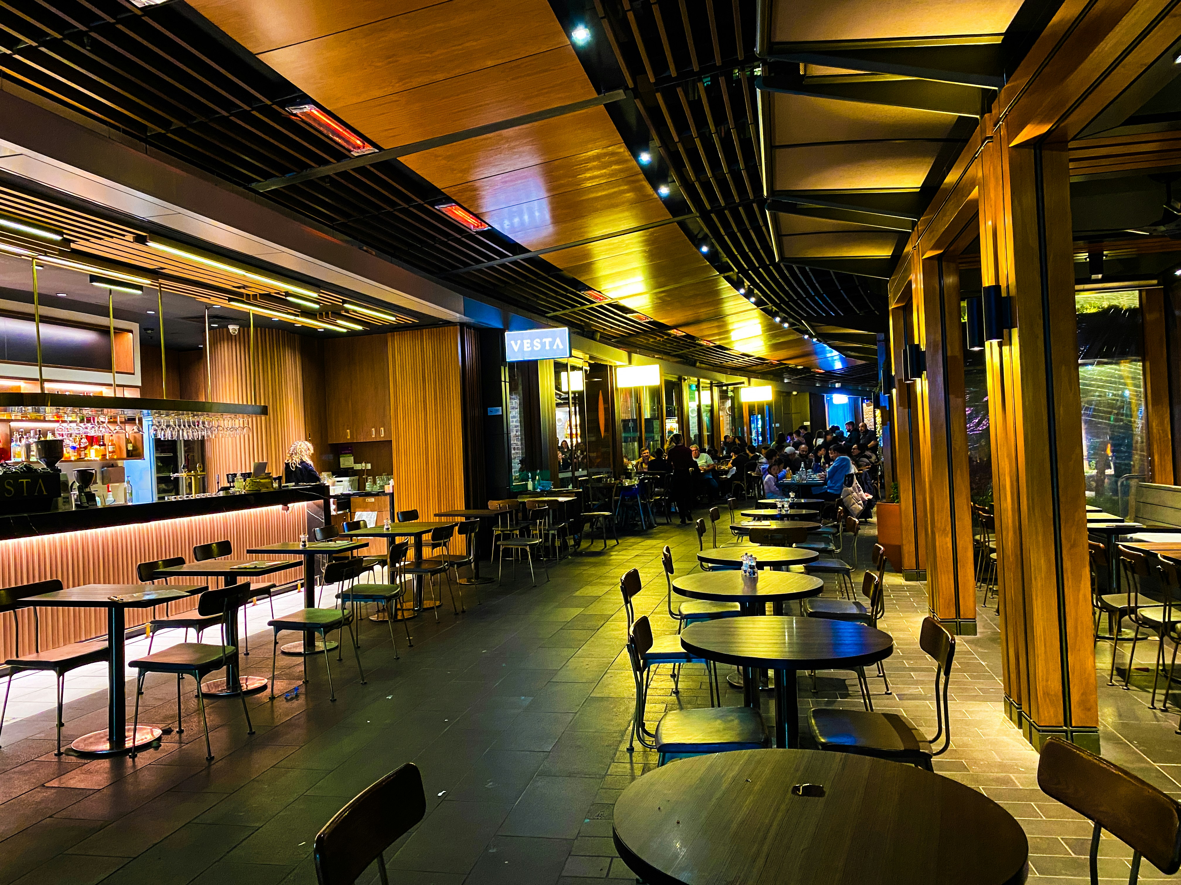 A restaurant filled with lots of tables and chairs