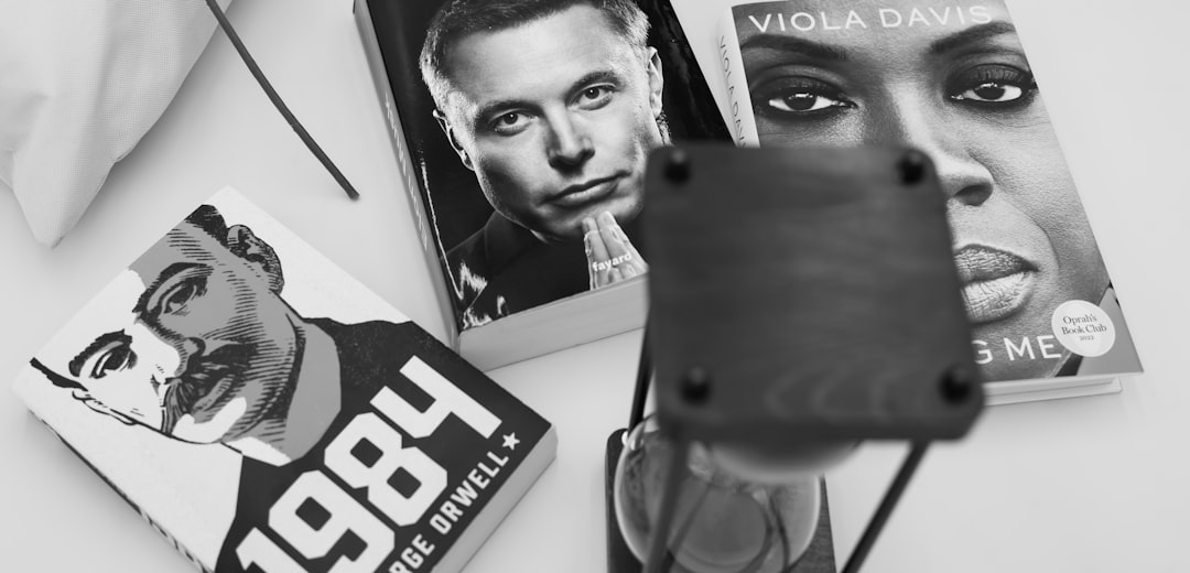 A table topped with books and a pair of gloves
