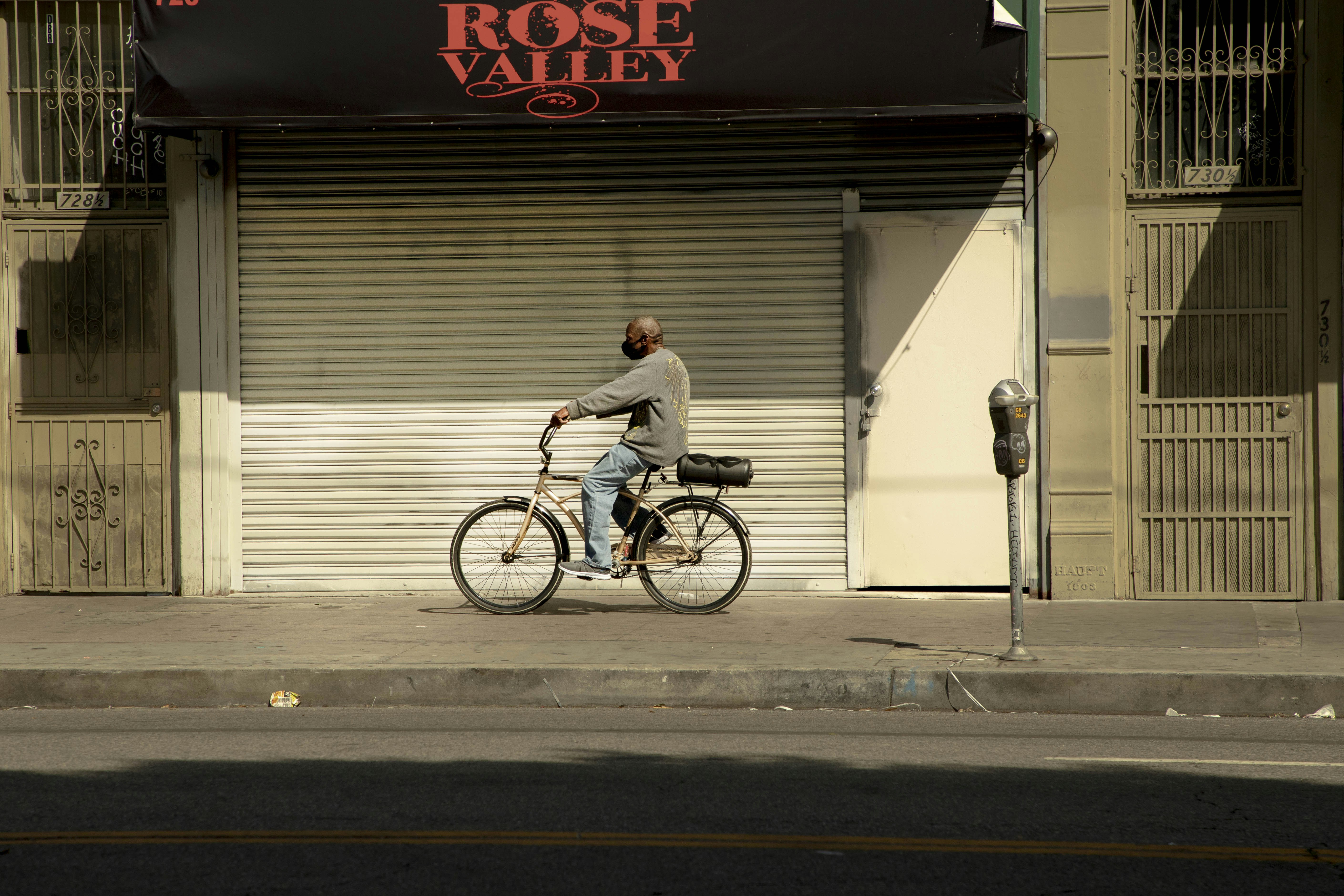 Empty city street during COVID-19 lockdown with closed storefronts