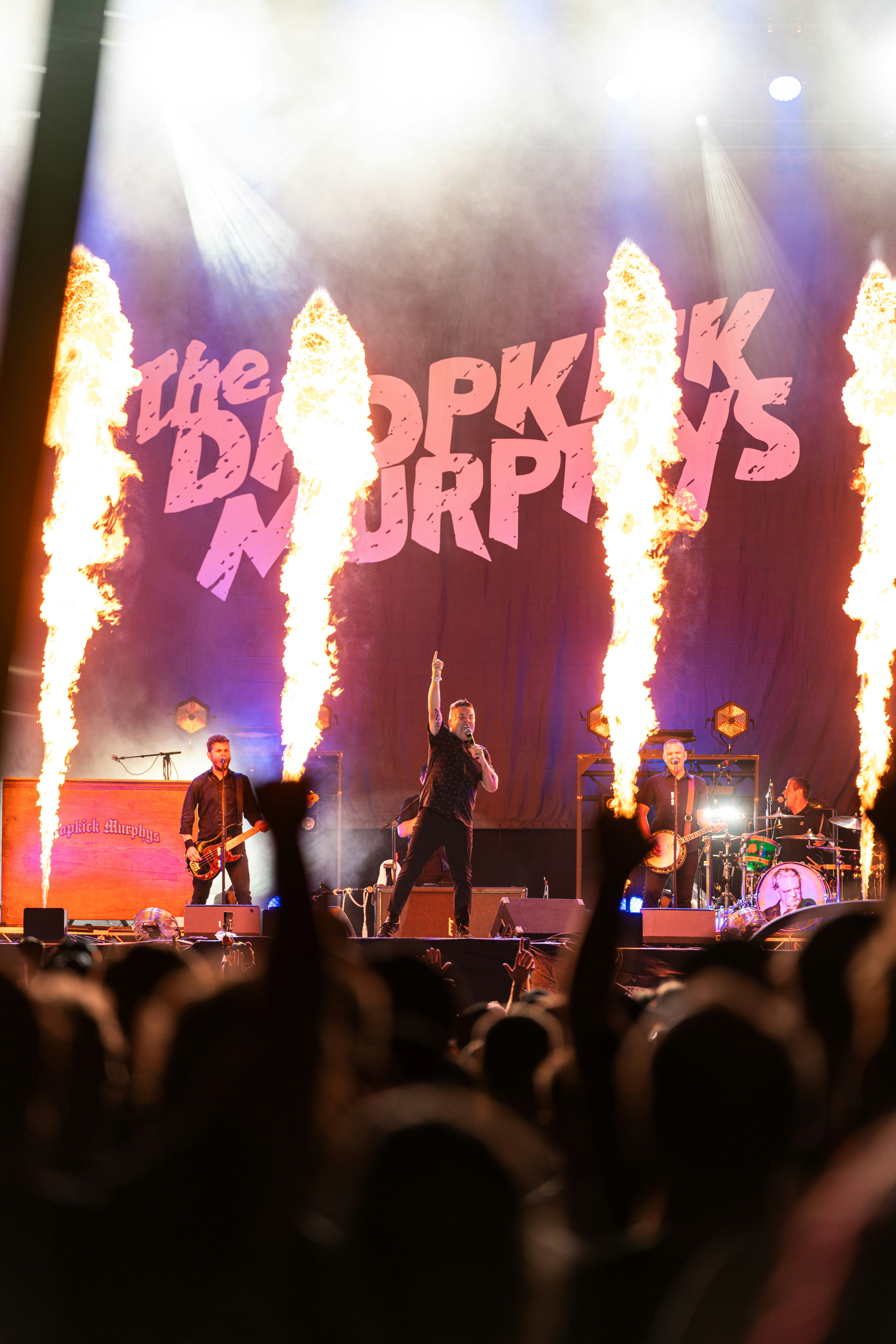 A group of people standing on top of a stage