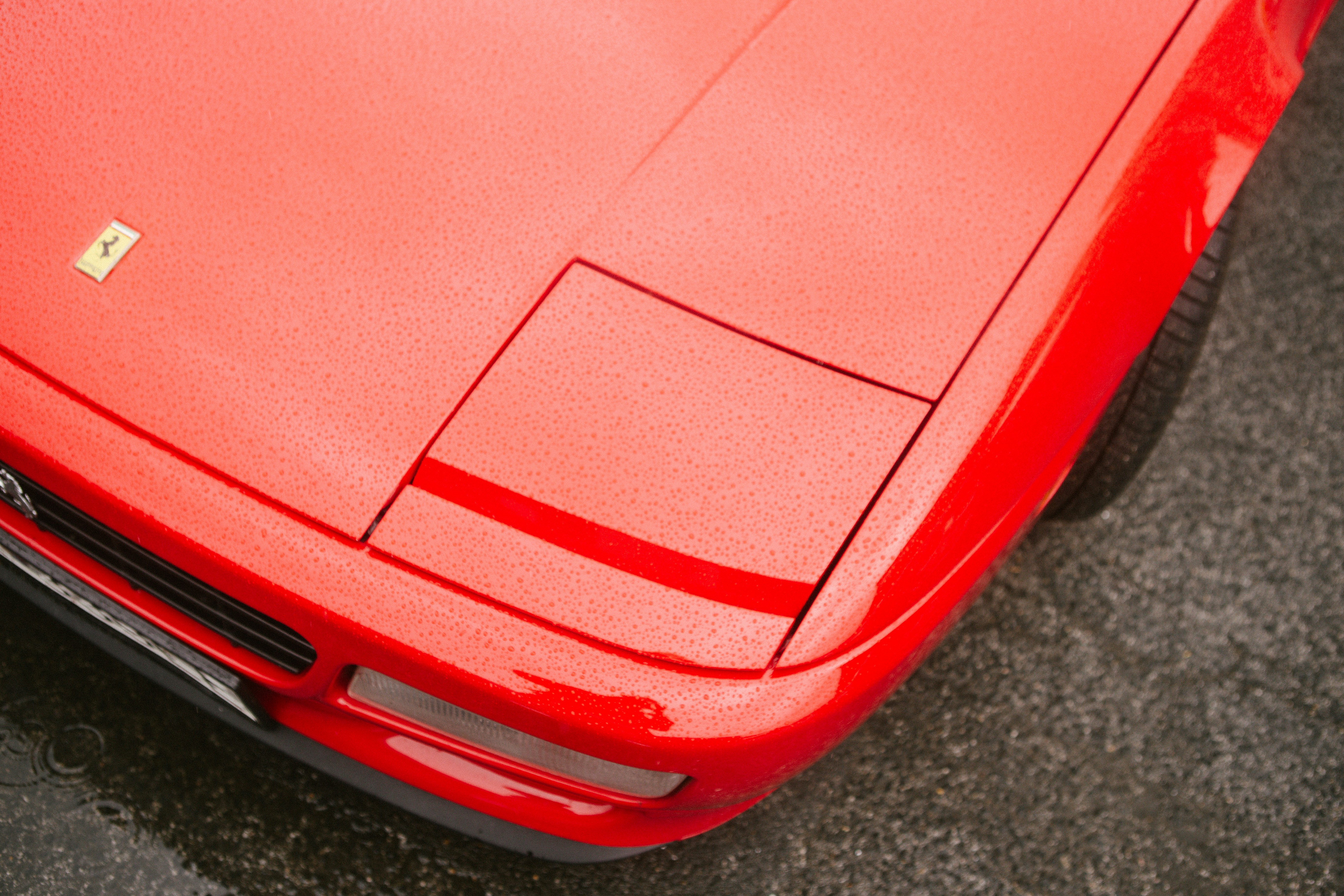 A close up of a red sports car