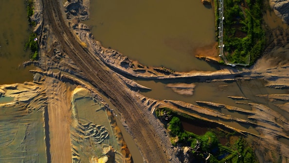 An aerial view of a river and a road