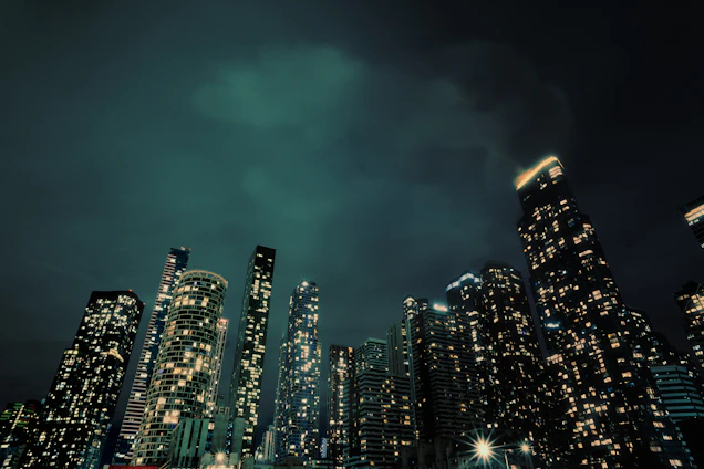 A city at night with a lot of tall buildings