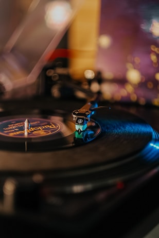 A turntable with a record player on top of it