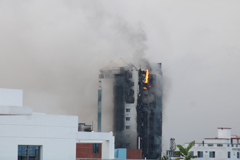 Smoke damage on a building exterior prior to soot removal