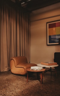 A living room with a couch and a table