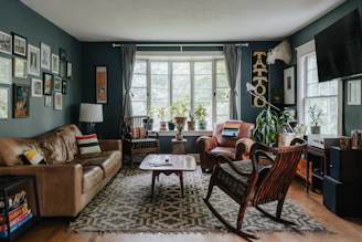 A living room filled with furniture and a flat screen TV