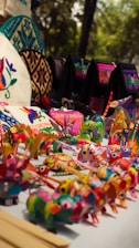 A table topped with lots of colorful items