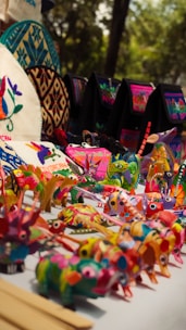 A table topped with lots of colorful items
