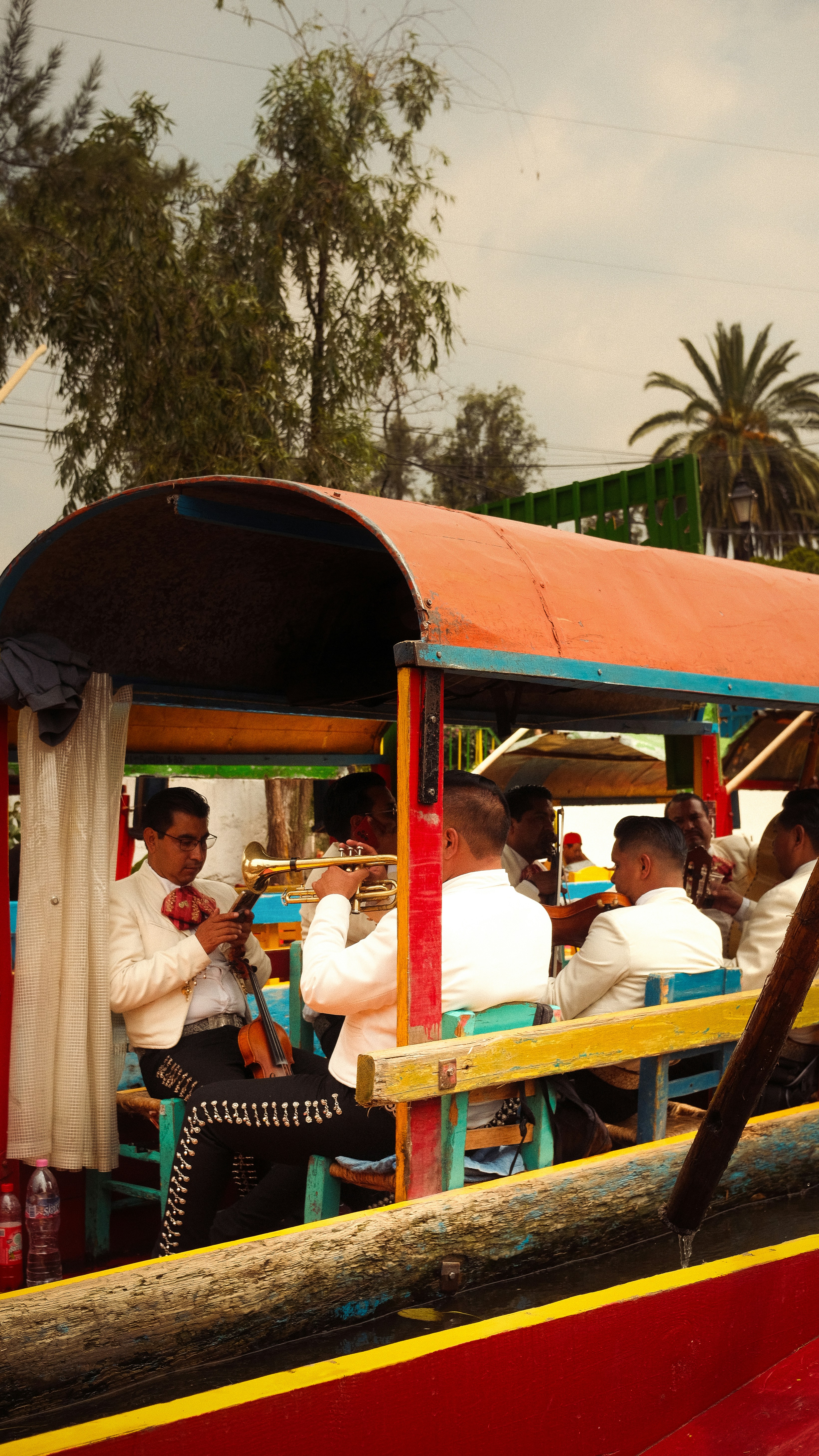 A group of people riding on top of a boat