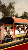 A group of people riding on top of a boat