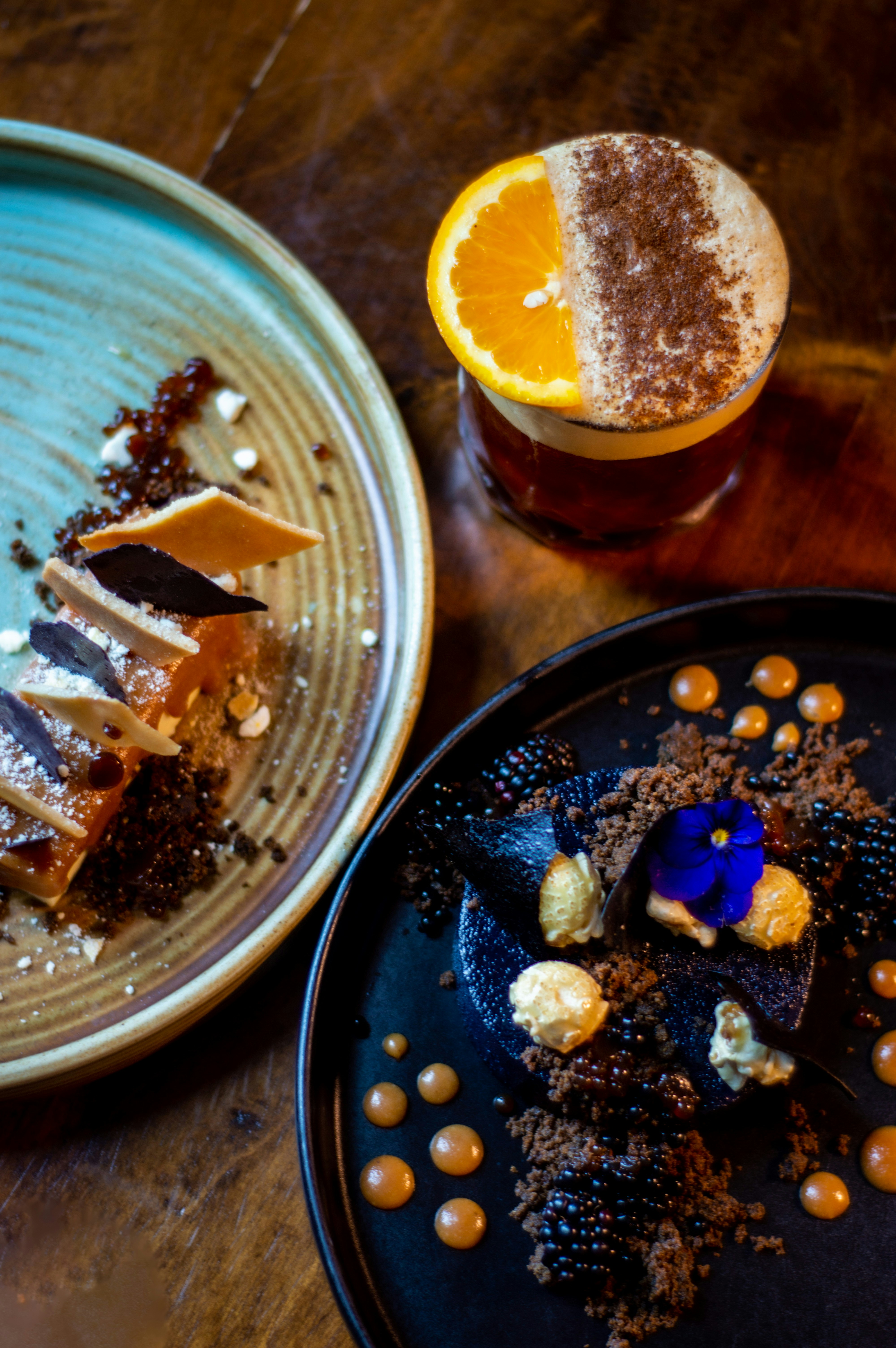 A table topped with two plates of food