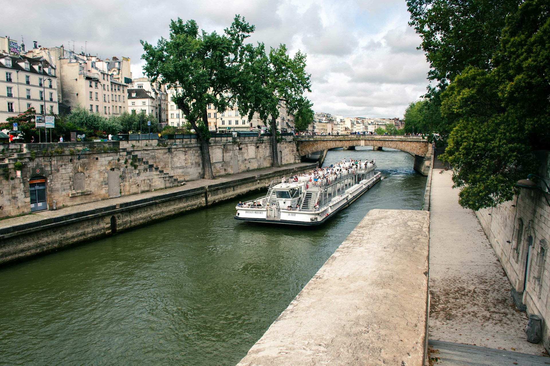 A couple of boats that are sitting in the water