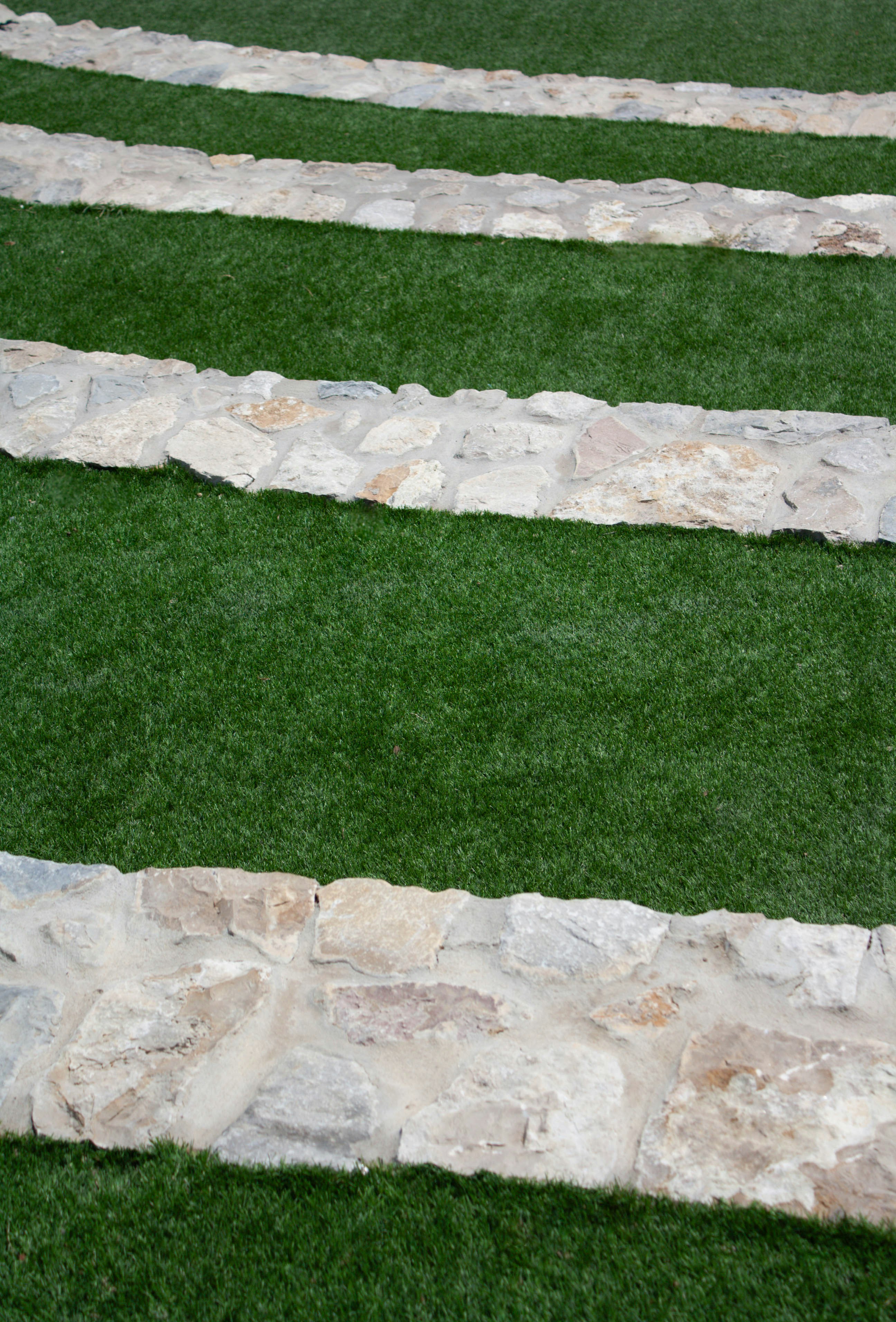 A set of stepping stones on artificial grass