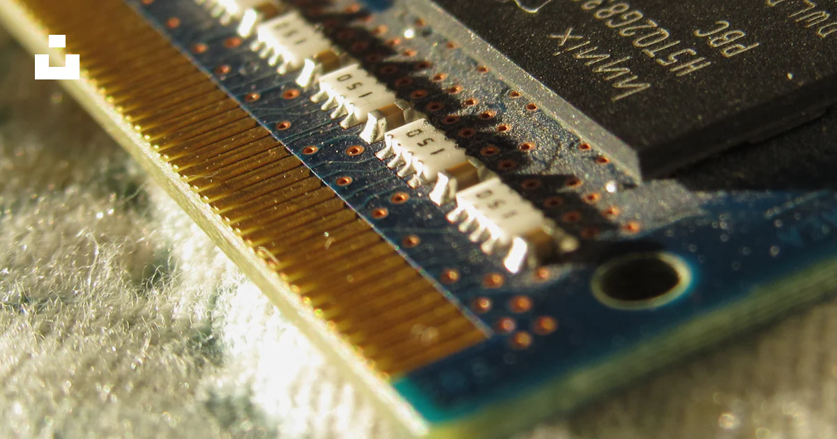 A close up of a computer motherboard with a small chip photo – Free ...