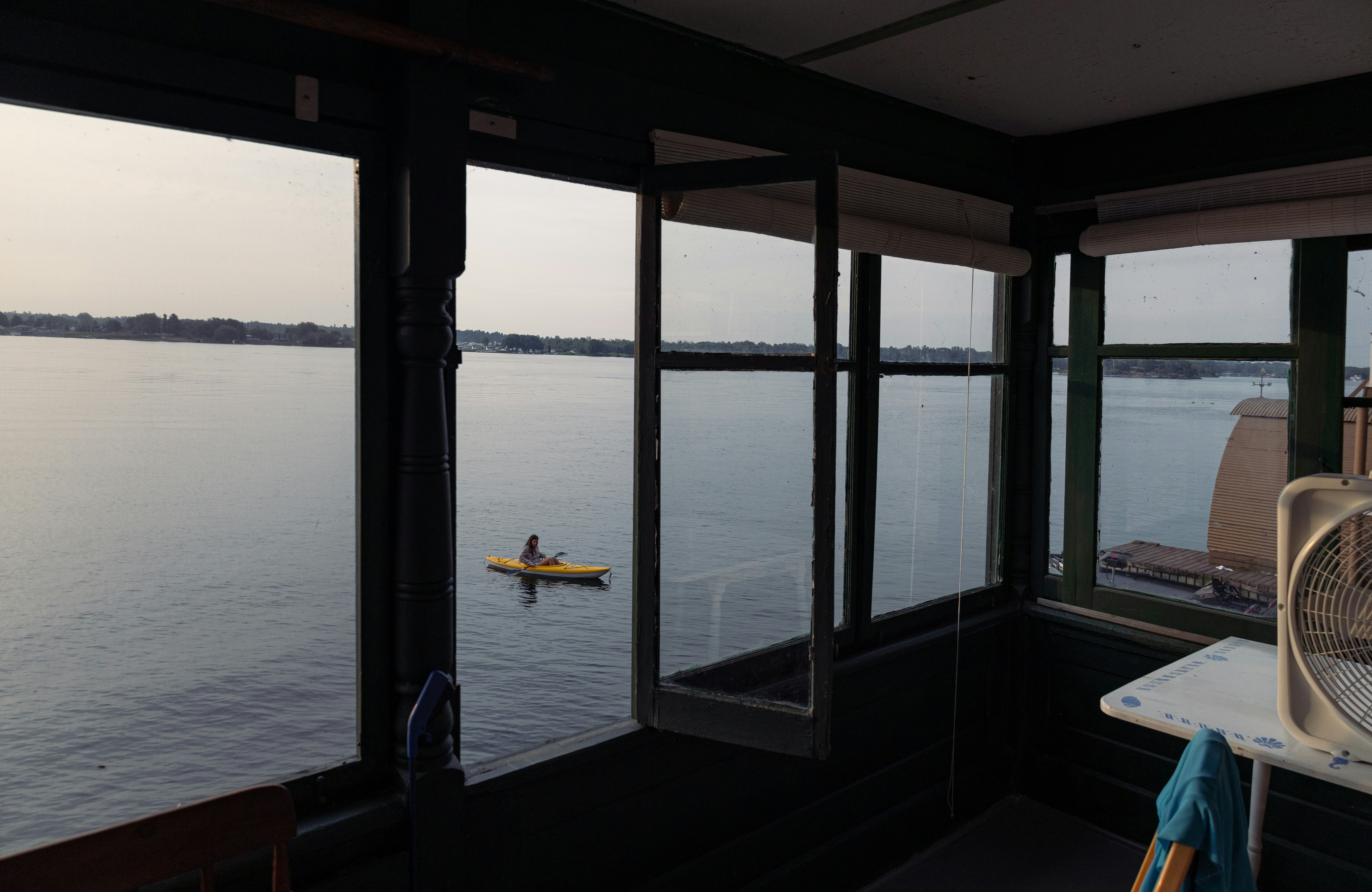 A serene lake view from an apartment - city view apartments for rent