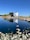 A large body of water surrounded by rocks