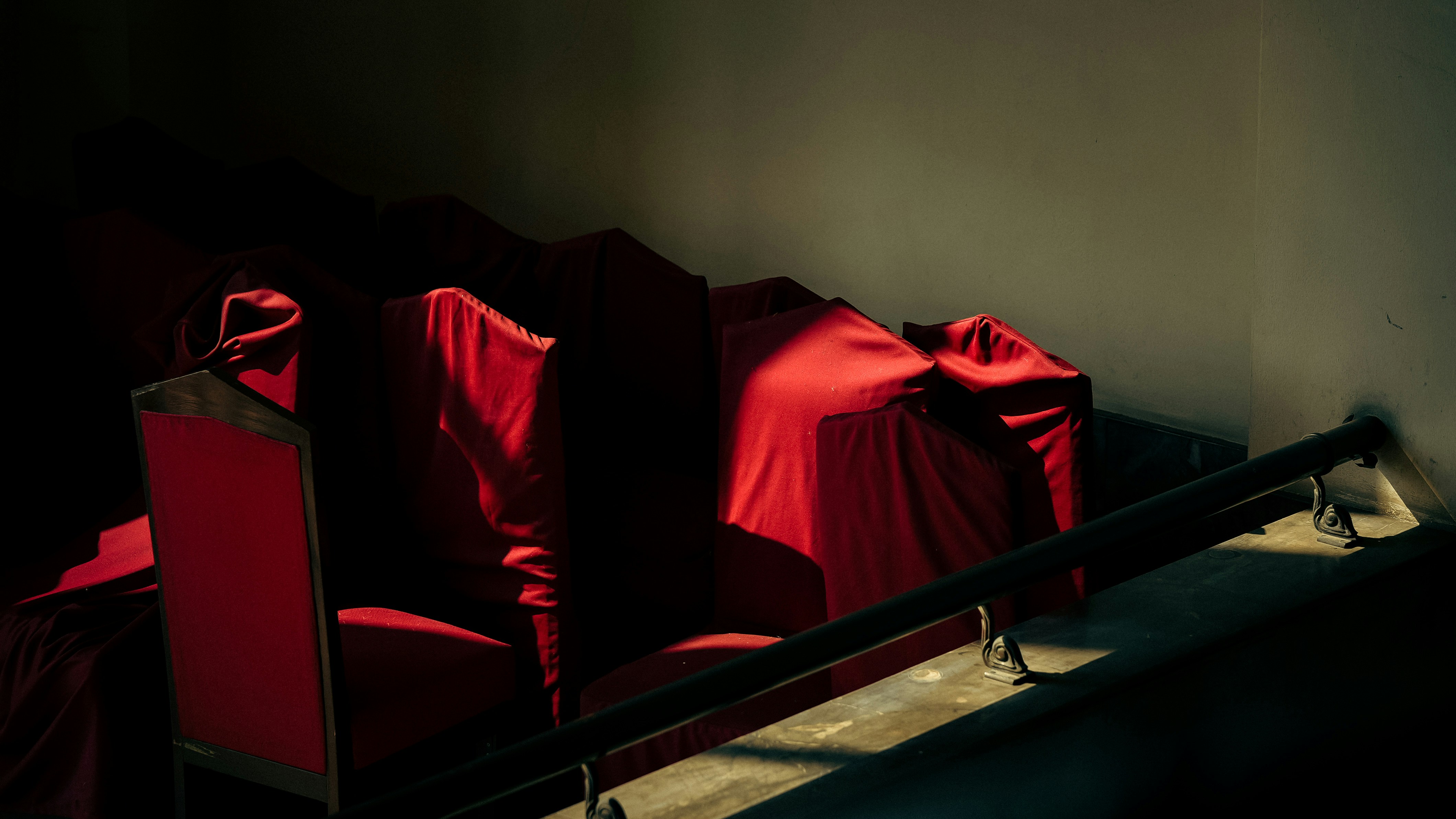 Red chair in the dark