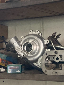 A close up of a metal object on a shelf