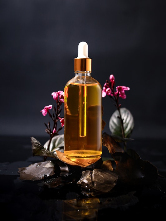 A bottle of oil sitting on top of a table
