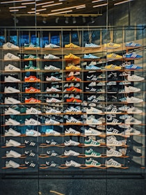 A display case filled with lots of shoes