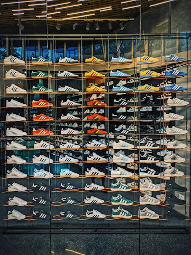A display case filled with lots of shoes