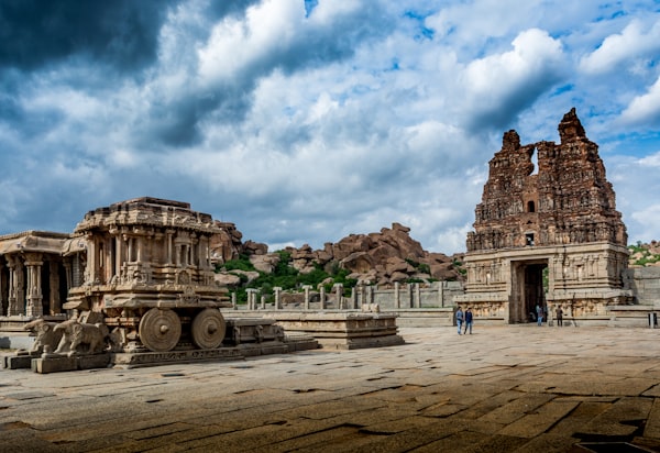 Sunset over Virupaksha Temple with Hampi’s boulder-strewn landscape and Tungabhadra River