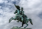 A statue of a man riding a horse