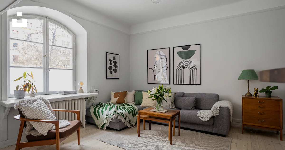A living room filled with furniture and a large window photo – Free ...