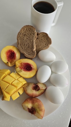 A white plate topped with different types of food