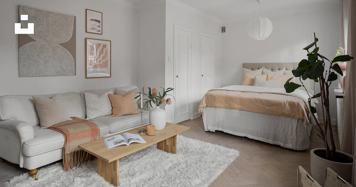 A living room filled with furniture and a bed photo – Free Interior ...