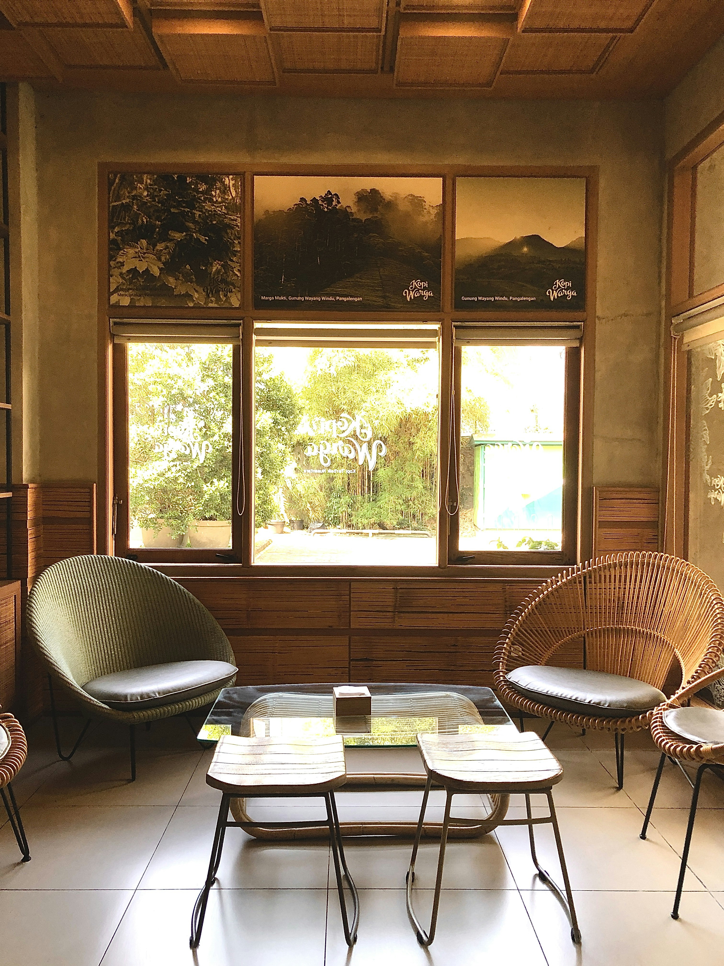 A living room filled with furniture and windows