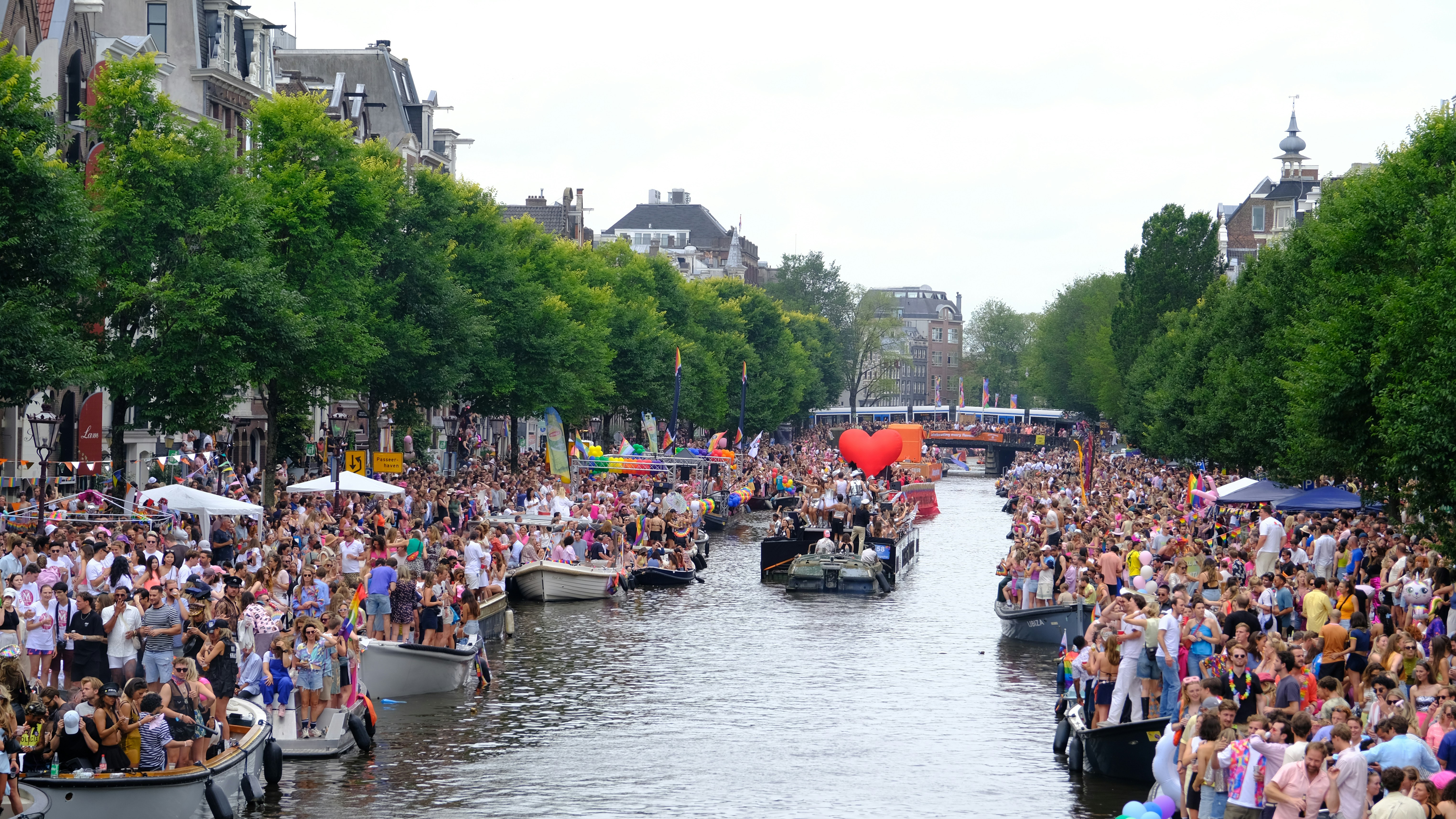A large group of people on boats on a river