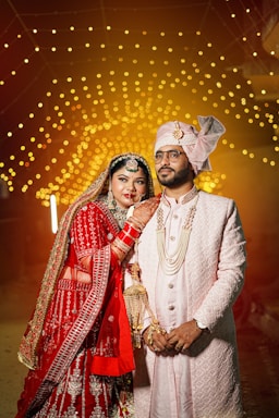 A bride and groom posing for a picture