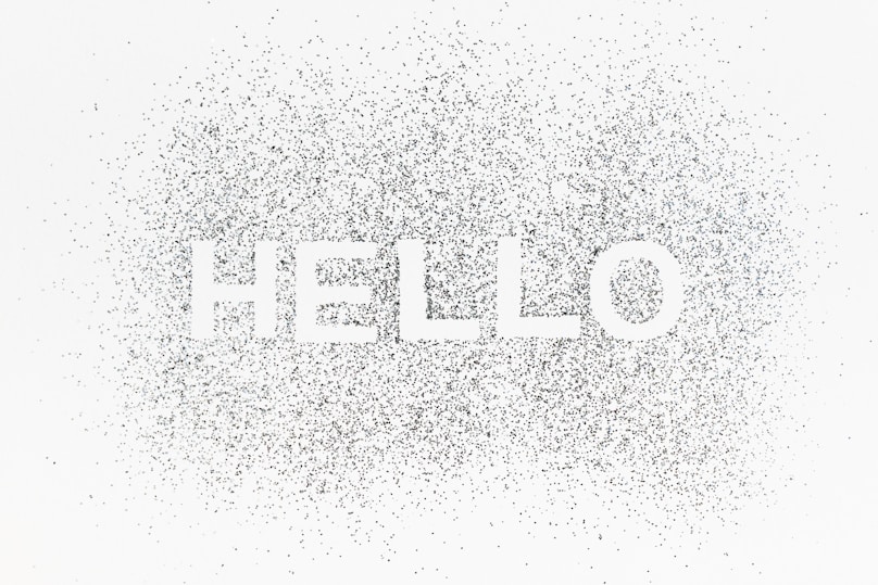 The words hello written in white on a white background