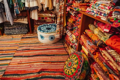 A room filled with lots of colorful rugs