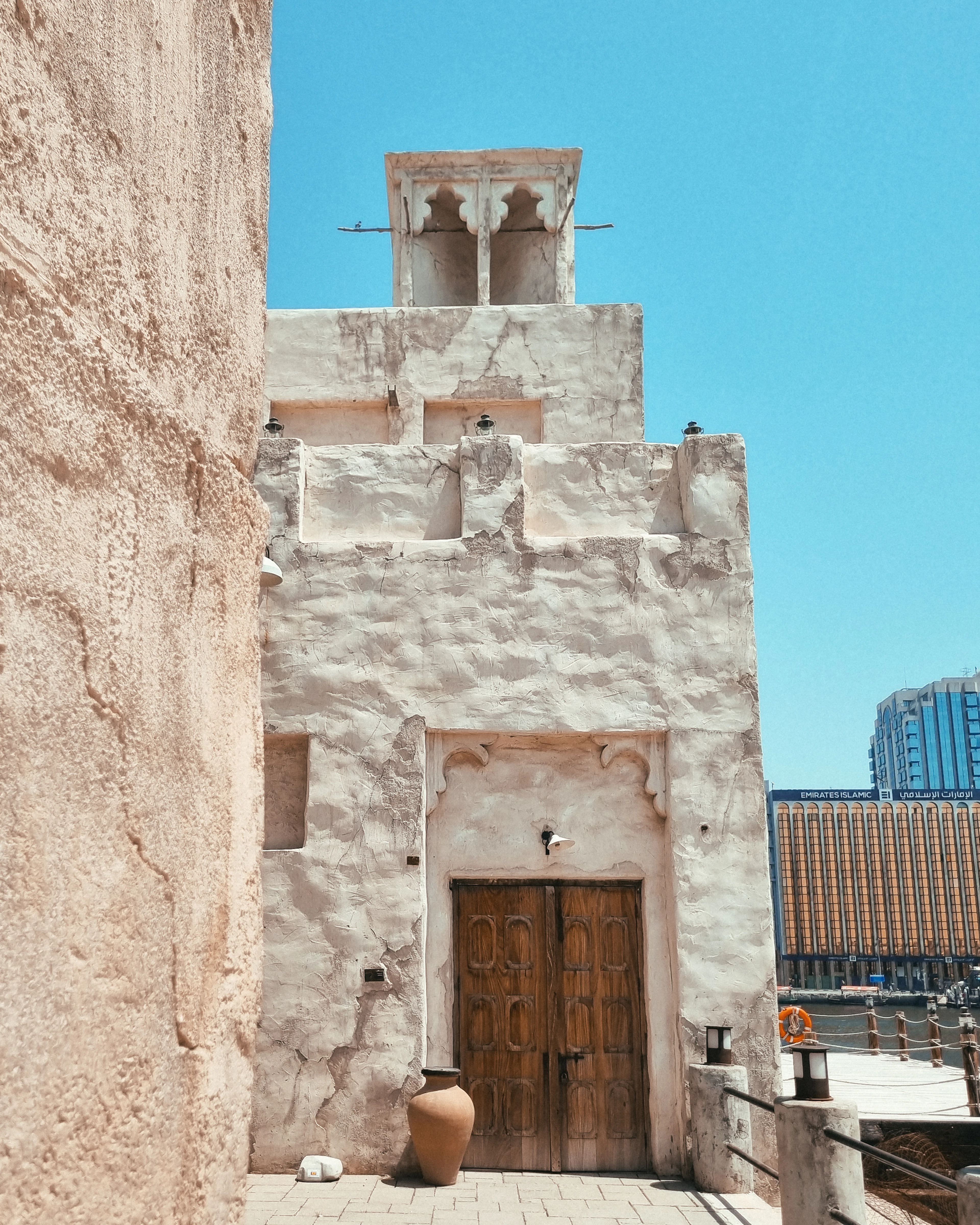 Traditional building with a carved wooden door in old Bur Dubai