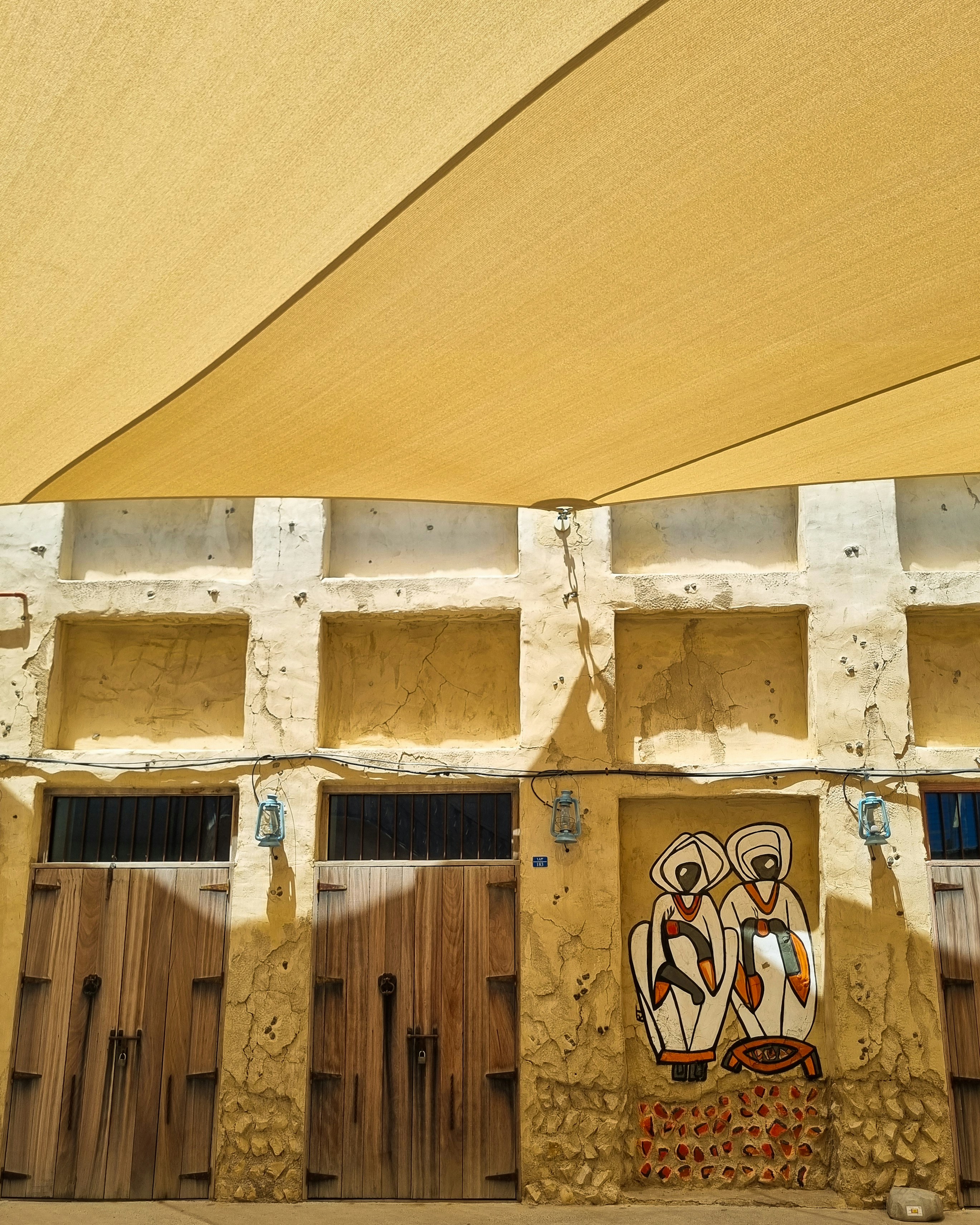 A building with a mural on the side of it