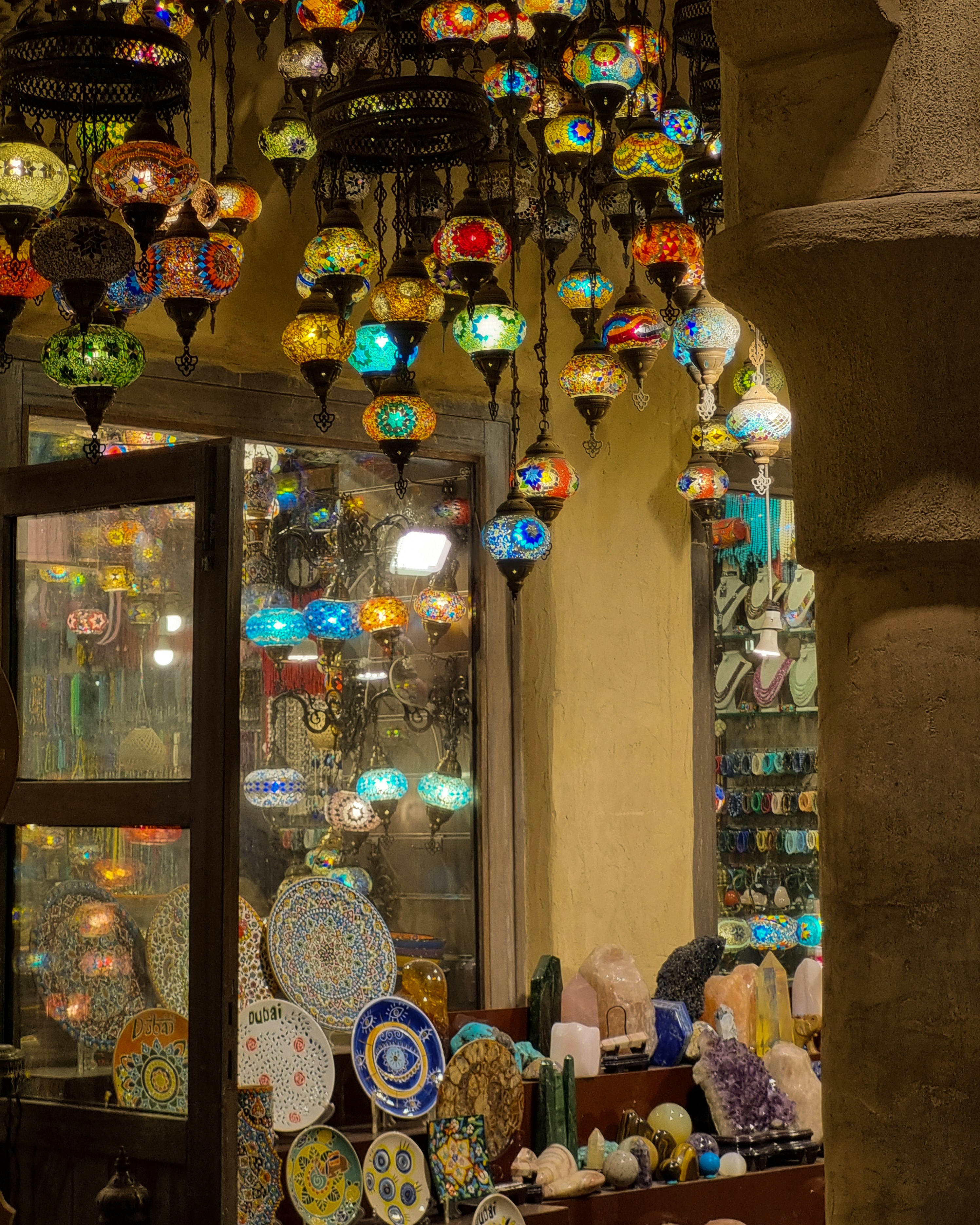 A shop with a lot of colorful glass items