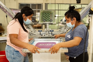 A couple of women standing next to each other