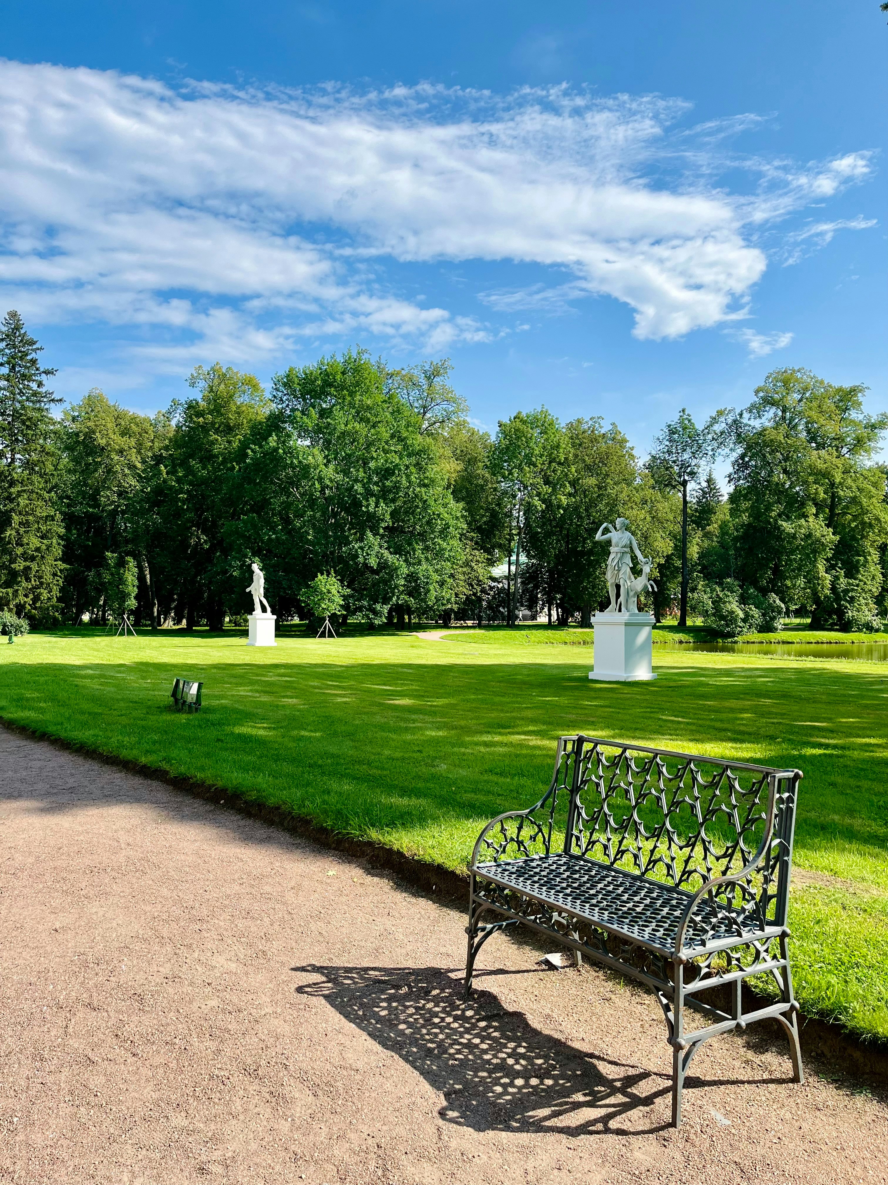 A bench sitting in the middle of a park