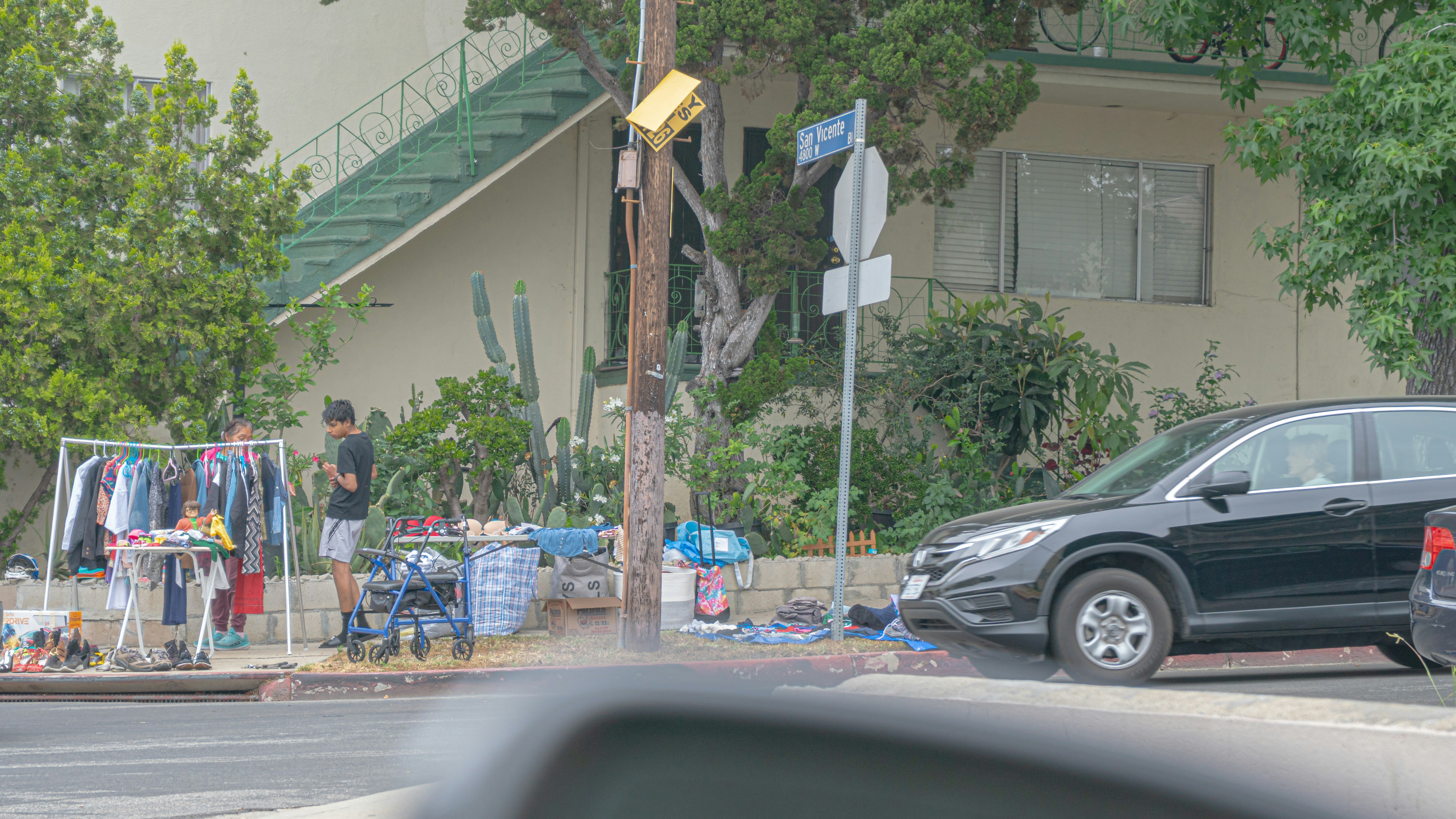 A car is parked on the side of the road